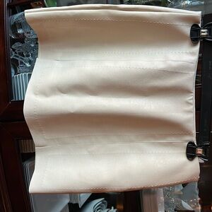 NWOT cream faux leather skirt.